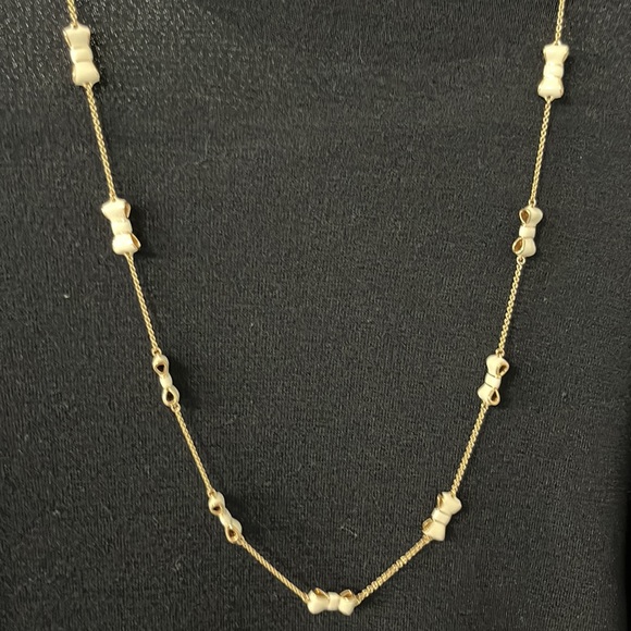 Kate Spade necklace. Gold tone with cream bows - Picture 2 of 4